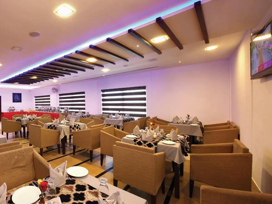 Hotel Aswathy Kodungallur Bagian luar foto